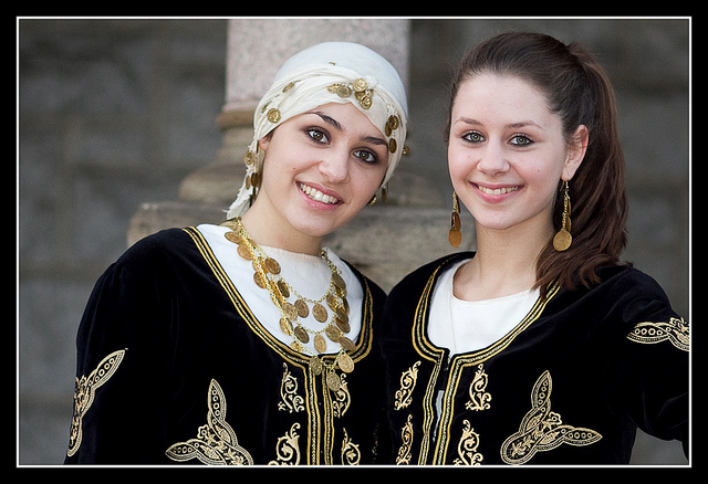 Smiling Greek girls in cultural outfits. Image by Dorret